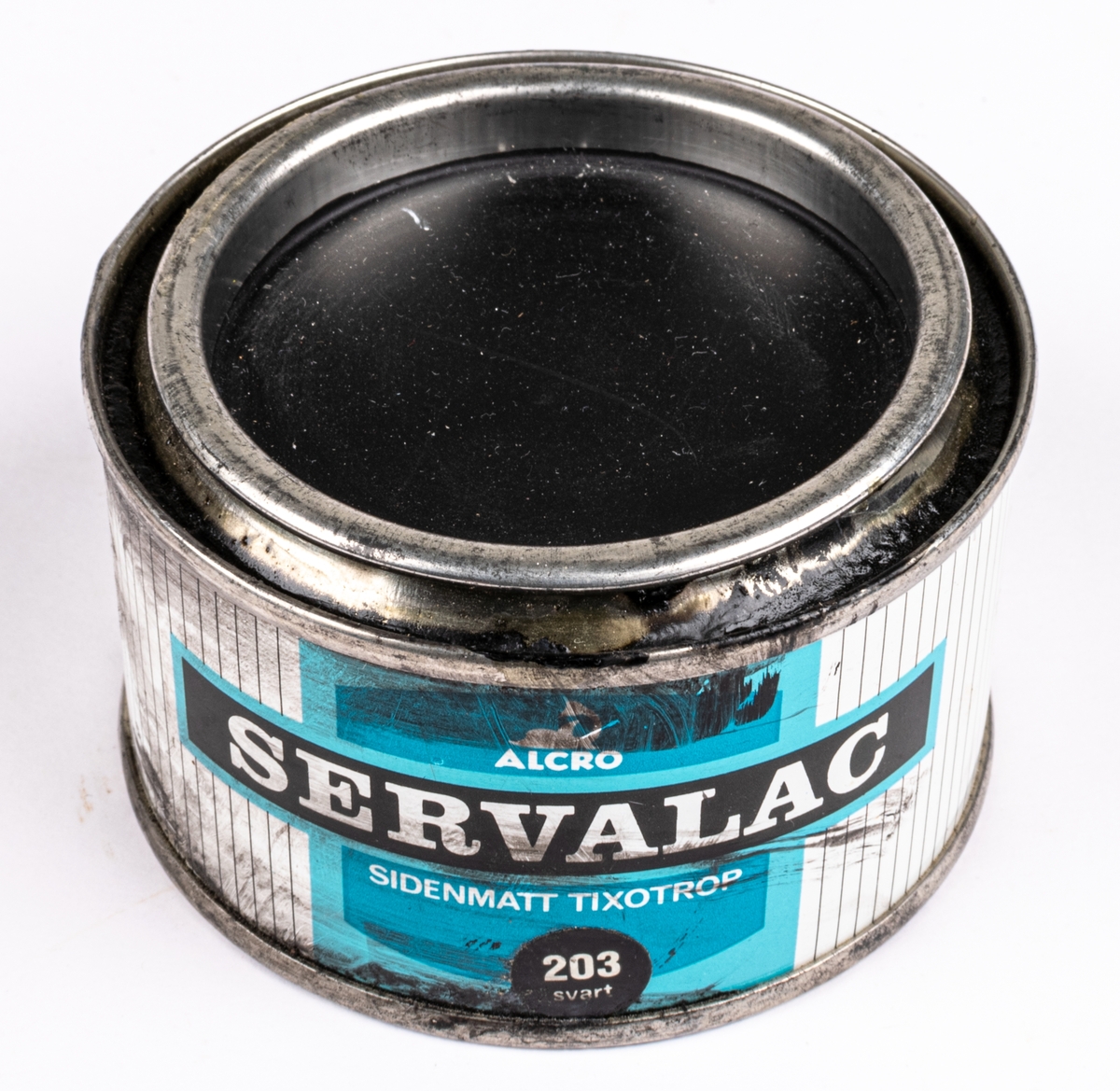 En plåtburk innehållande Servalac - Sidenmatt Trixotrop. Alcro.