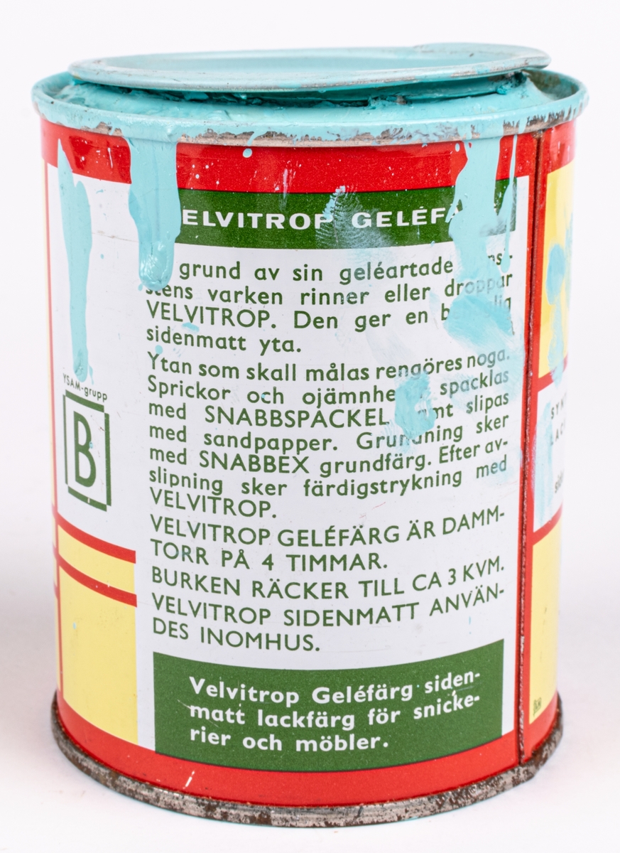 En plåtburk med målarfärg från Aktiebolaget Eug. Wingård, Malmö.
Velvitrop Geléfärg "Lustblått".