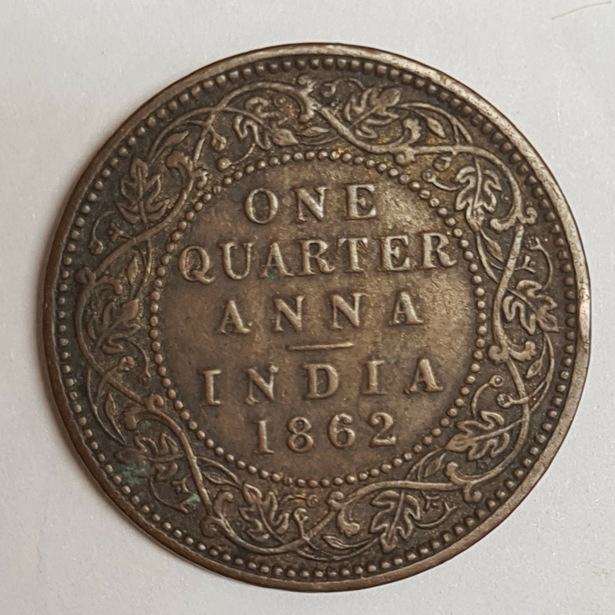 Två mynt från Indien/Storbritanien.
1/4 Anna, 1862
1/4 Anna, 1862