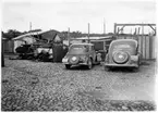 H län, Hamnförrådet i Kalmar. Avvecklades 1946. Översikt med diverse förrådsbyggnader, upplag av diverse material, 