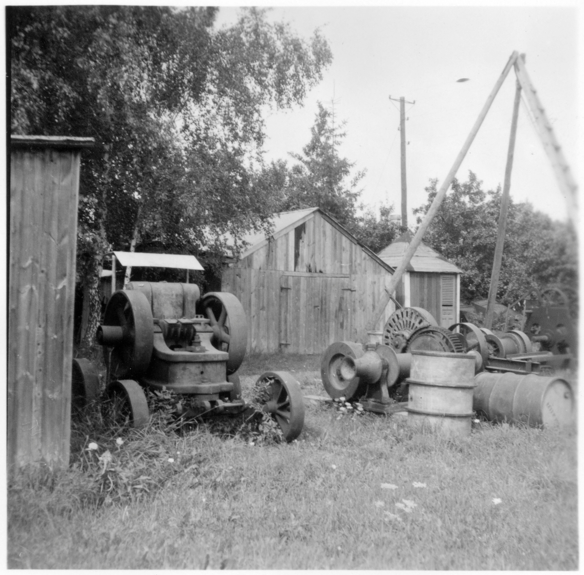 I län, Hamnförrådet, Visby. Förrådsbyggnader, upplag av diverse material, "skrot", stenkross. 