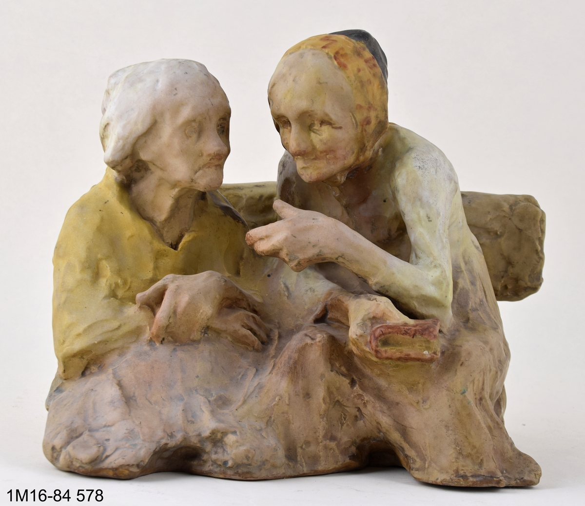 Skulptur. Titel: "Efter messan", patinerad i flera färger, osignerad.