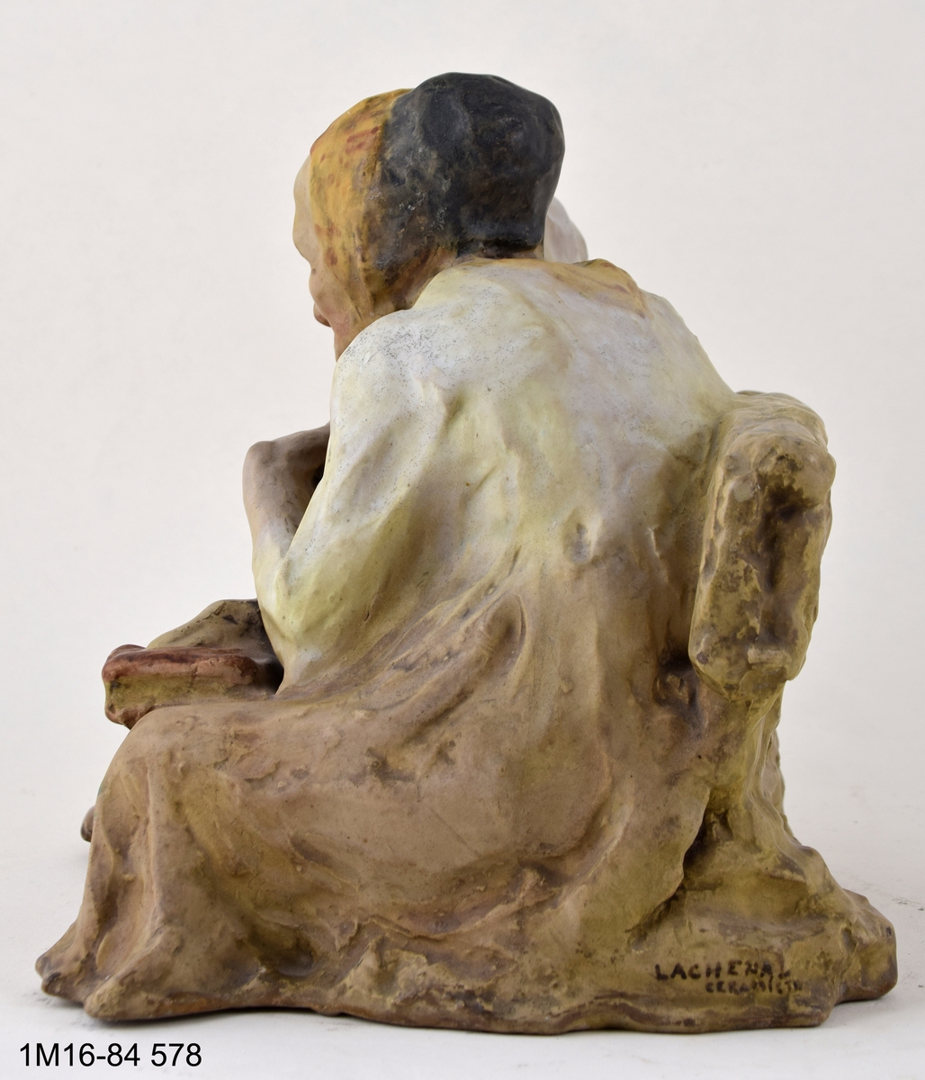 Skulptur. Titel: "Efter messan", patinerad i flera färger, osignerad.