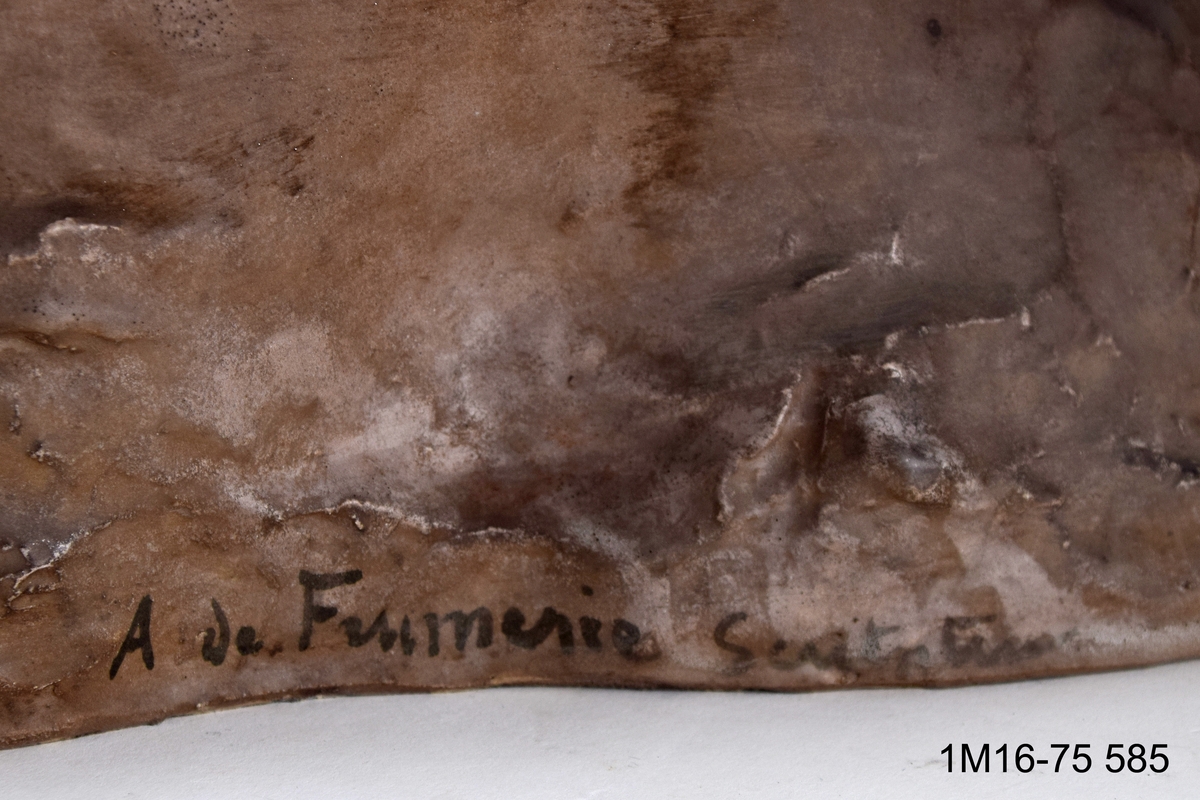 Skulptur. Titel: En fråga.