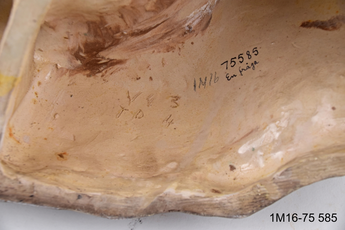 Skulptur. Titel: En fråga.