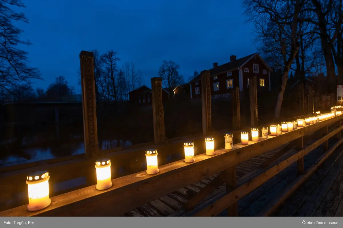 Ljusmanifestation mot rivningen av Järle kvarndamm 10 december 2020.