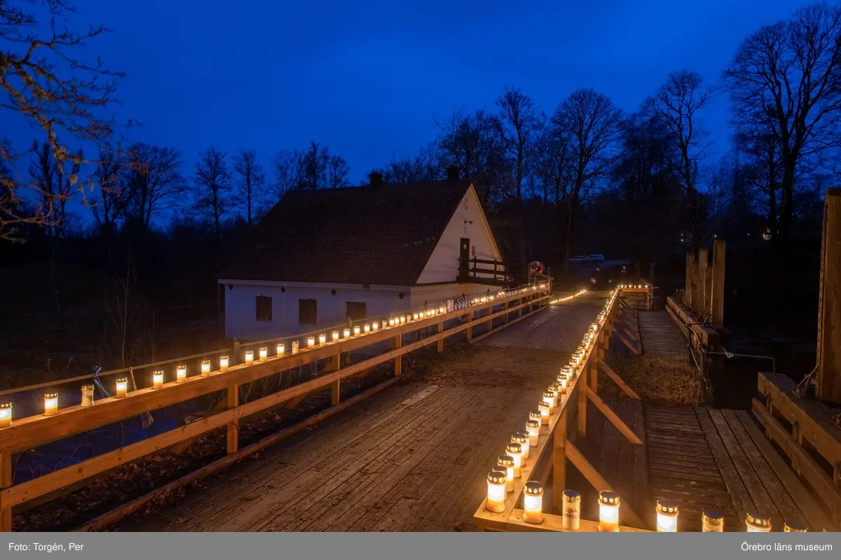 Ljusmanifestation mot rivningen av Järle kvarndamm 10 december 2020.