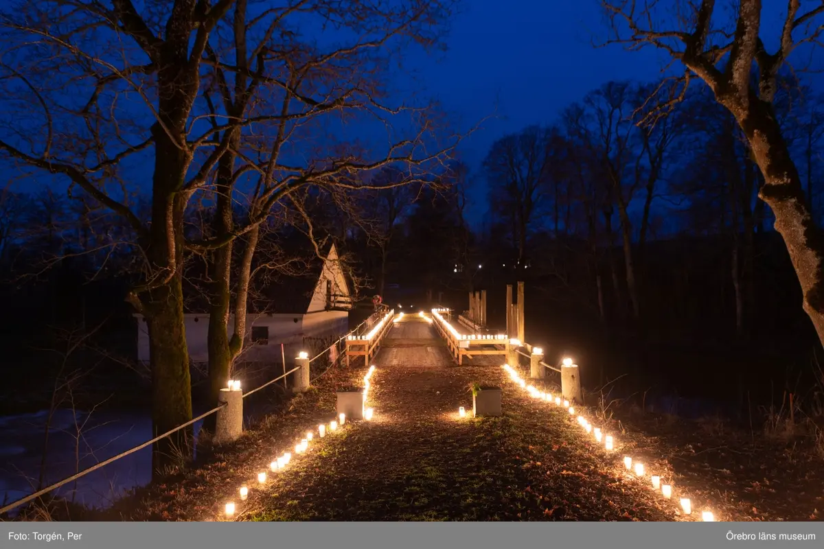 Ljusmanifestation mot rivningen av Järle kvarndamm 10 december 2020.