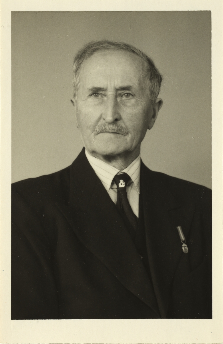 Portrett av Nils Betten, representant fra Vadsø Forsvarsforening.