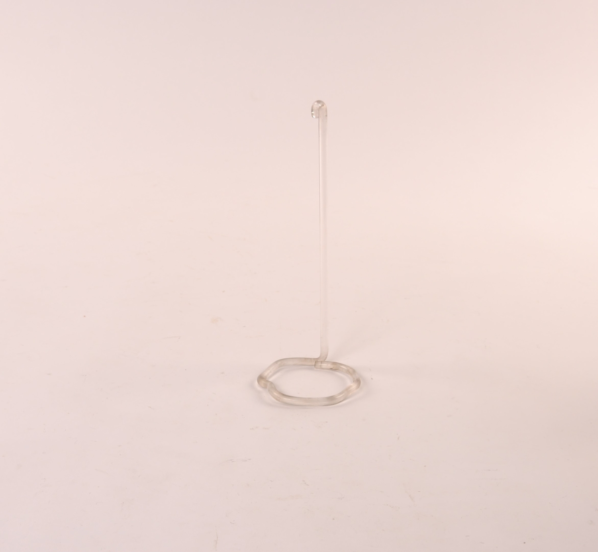 Holder i klart glass. Glass-stav med rett stang og overgang til sirkelform.