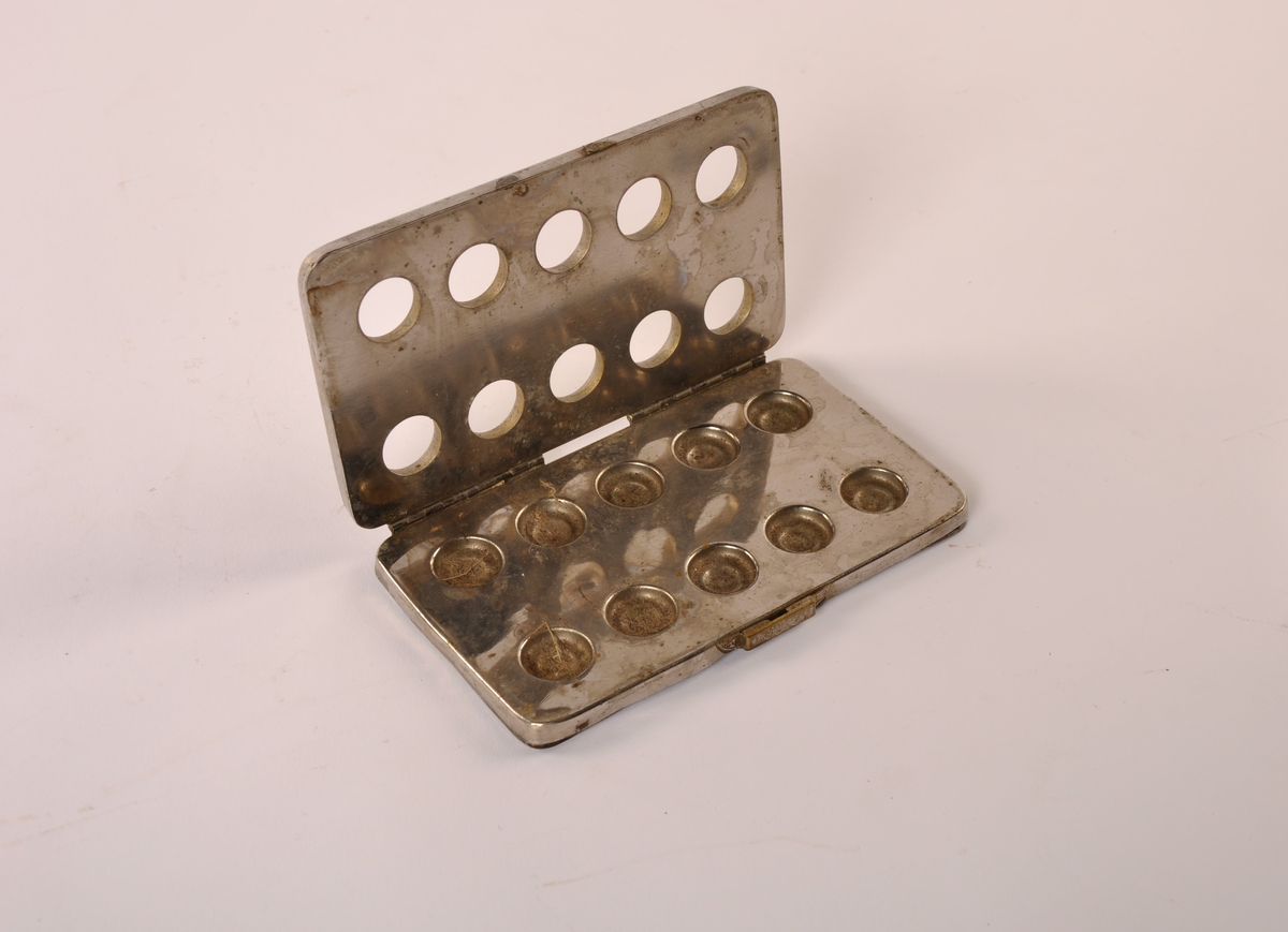 Kapselapparat av metall.