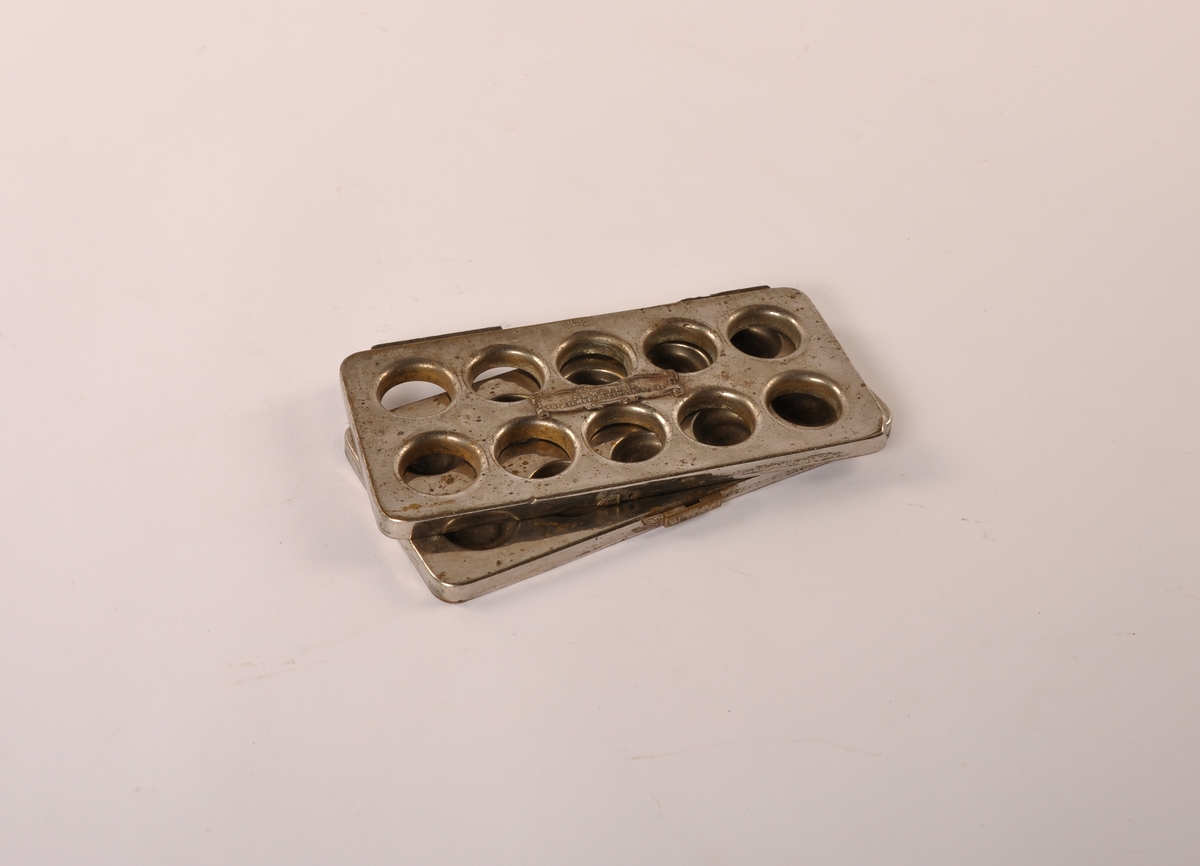 Kapselapparat av metall.