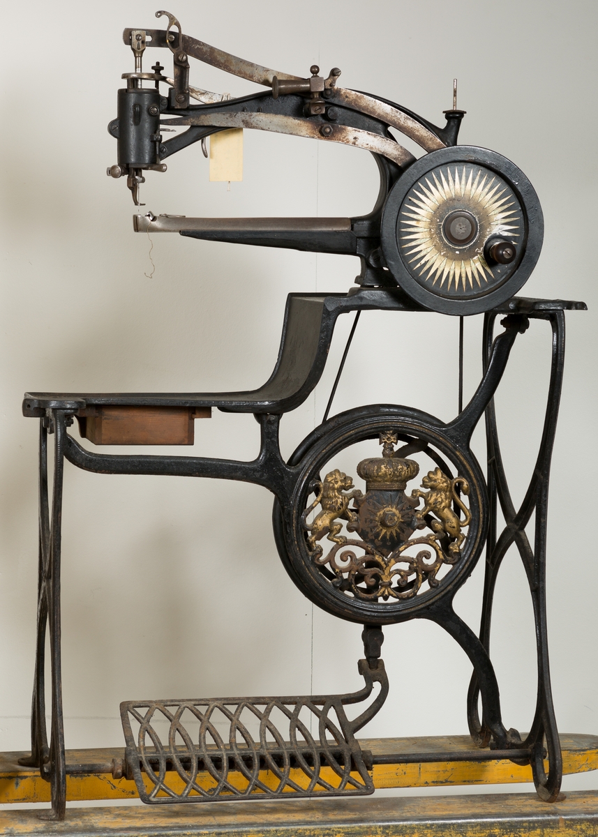 Pedaldrevet symaskin for en skomaker