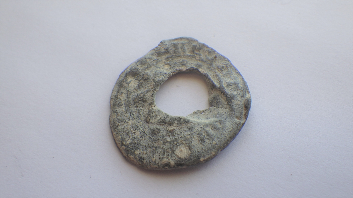 Våpenskjold med ukjent innhold, legende. 