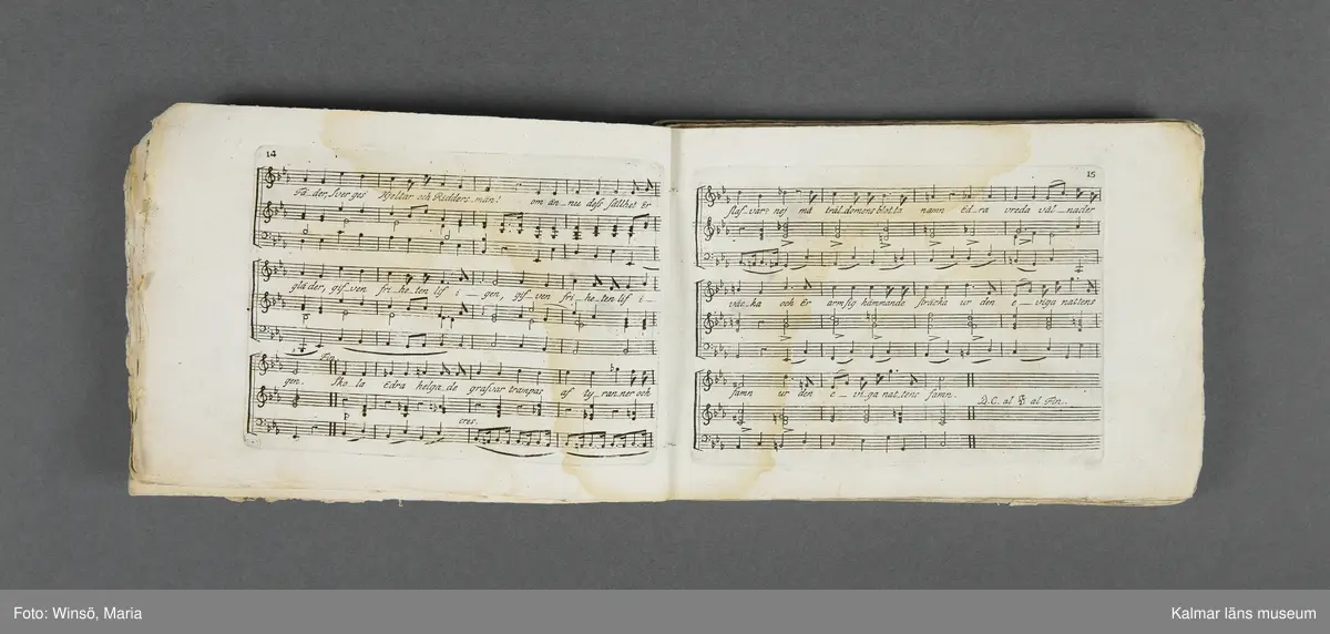 KLM 21069:1. Notbok, tryck. Av papper. På omslaget: Musikaliskt Tidsfördrif för år 1802. Stockholm och Kongl. Priviligierade Not-Tryckeriet. Tvärformat. Sidor 77-80 saknas. Kompositioner av bl.a. Naumann, Della-Maria, Åhlström.