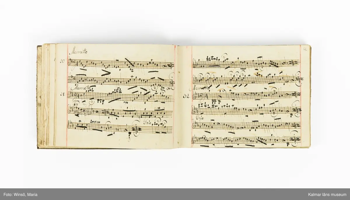 KLM 21071. Notbok, handskrift. Tvärformat. Helt skinnband med marmorering samt guldpräglade dekorelement. På pärmens framsida: VIOLINO PRIMO. På försättsbladet: I:N:J:C. samt Adam Lorentz Stålhammar ao 1773. Därefter handskrivna kompositioner, menuetter.