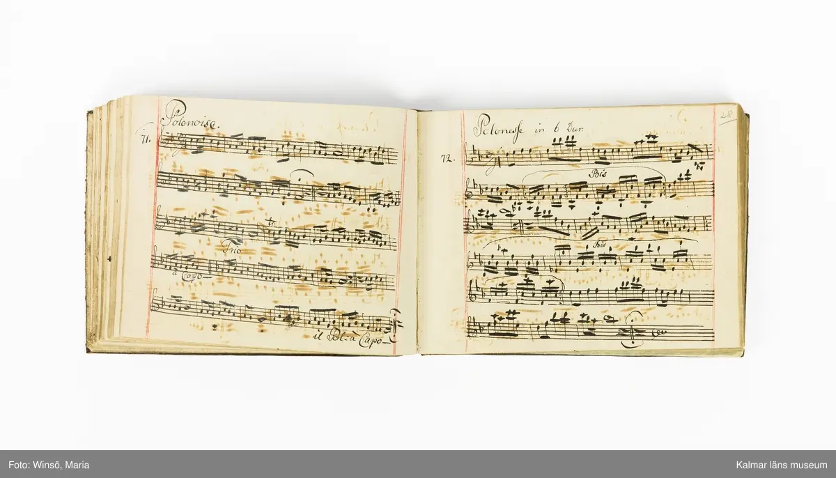 KLM 21071. Notbok, handskrift. Tvärformat. Helt skinnband med marmorering samt guldpräglade dekorelement. På pärmens framsida: VIOLINO PRIMO. På försättsbladet: I:N:J:C. samt Adam Lorentz Stålhammar ao 1773. Därefter handskrivna kompositioner, menuetter.