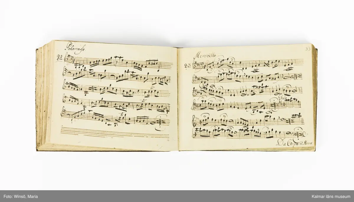 KLM 21071. Notbok, handskrift. Tvärformat. Helt skinnband med marmorering samt guldpräglade dekorelement. På pärmens framsida: VIOLINO PRIMO. På försättsbladet: I:N:J:C. samt Adam Lorentz Stålhammar ao 1773. Därefter handskrivna kompositioner, menuetter.