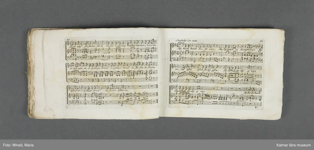 KLM 21069:1. Notbok, tryck. Av papper. På omslaget: Musikaliskt Tidsfördrif för år 1802. Stockholm och Kongl. Priviligierade Not-Tryckeriet. Tvärformat. Sidor 77-80 saknas. Kompositioner av bl.a. Naumann, Della-Maria, Åhlström.