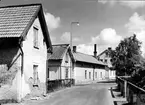 Gärdesgatan åt norr från Kopparslagaren. Från NM:s byggnadsinventering 1957.