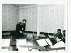 Mdir Oswald Brodin och några blåsmusiker.