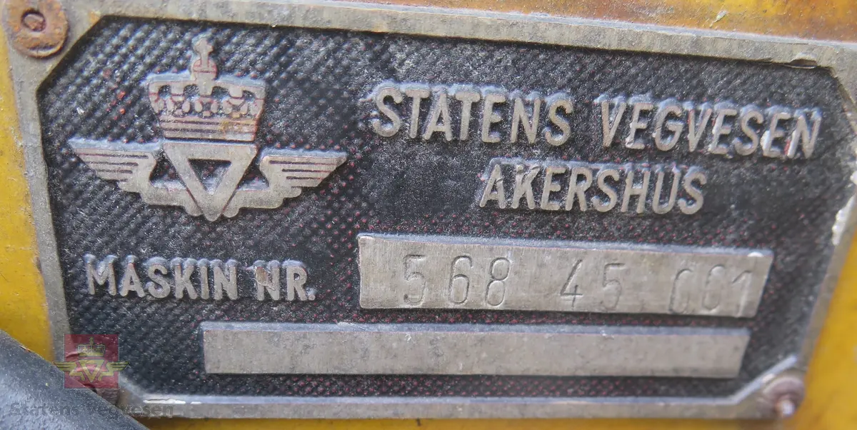 Feste for bruk på hjullaster. Gul og svart. Hydraulisk drevet.