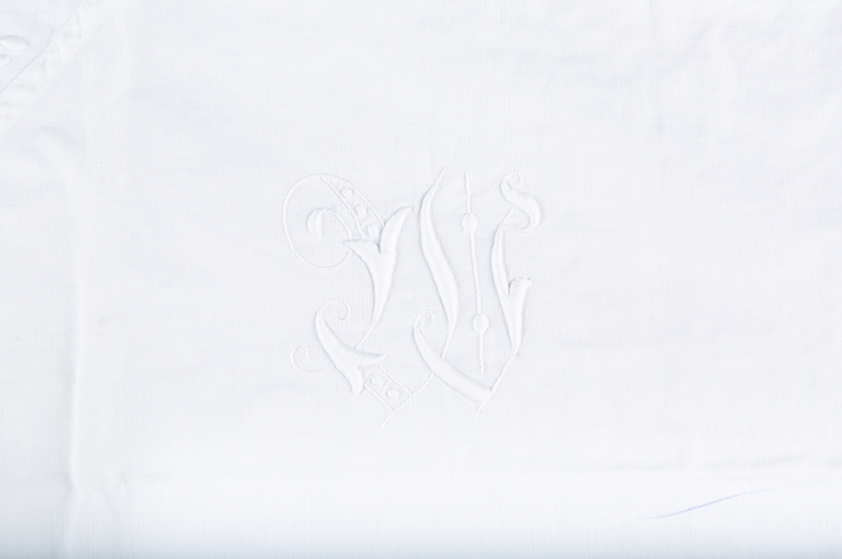 blomsterranke og monogram: W