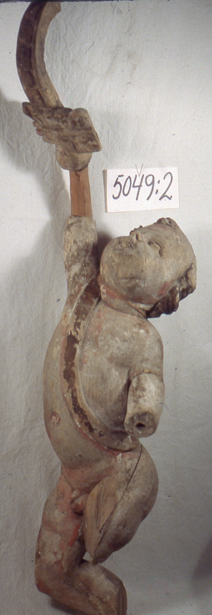 Delar av Gustaf II Adolfs och hans gemåls drottning Maria Eleonoras kungs.- och drottningsstolar i Skara domkyrka, en bänkdörr har inskriptionen Gars (Gustavus Adolphus rex Suecie) 1621 och den andra M.E.R.S 1621.