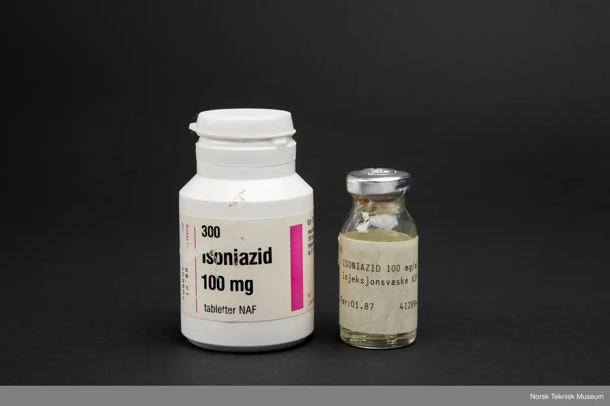 Liten medisinflaske med blankt innhold.