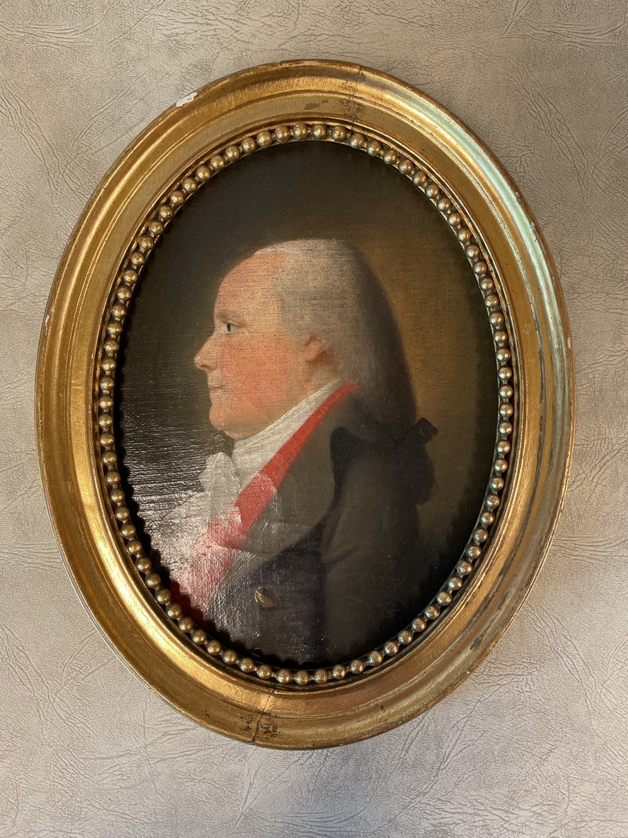 Porträtt av medelåldersman i profil, olja, i oval ram.