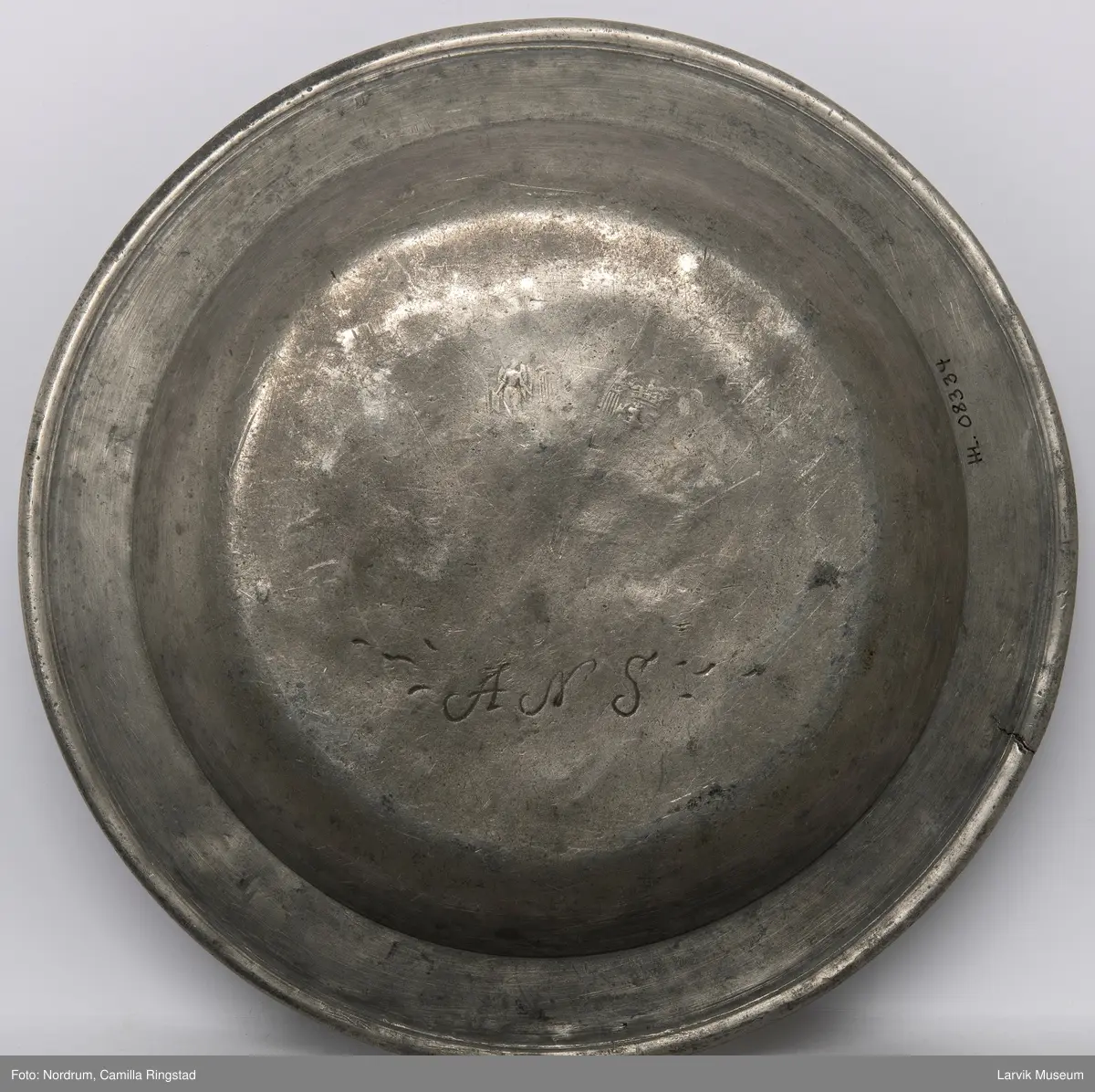 Initialene ANS på undersiden