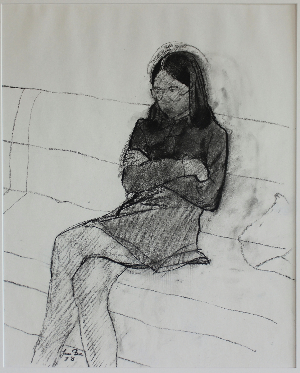 Flicka som ser på TV