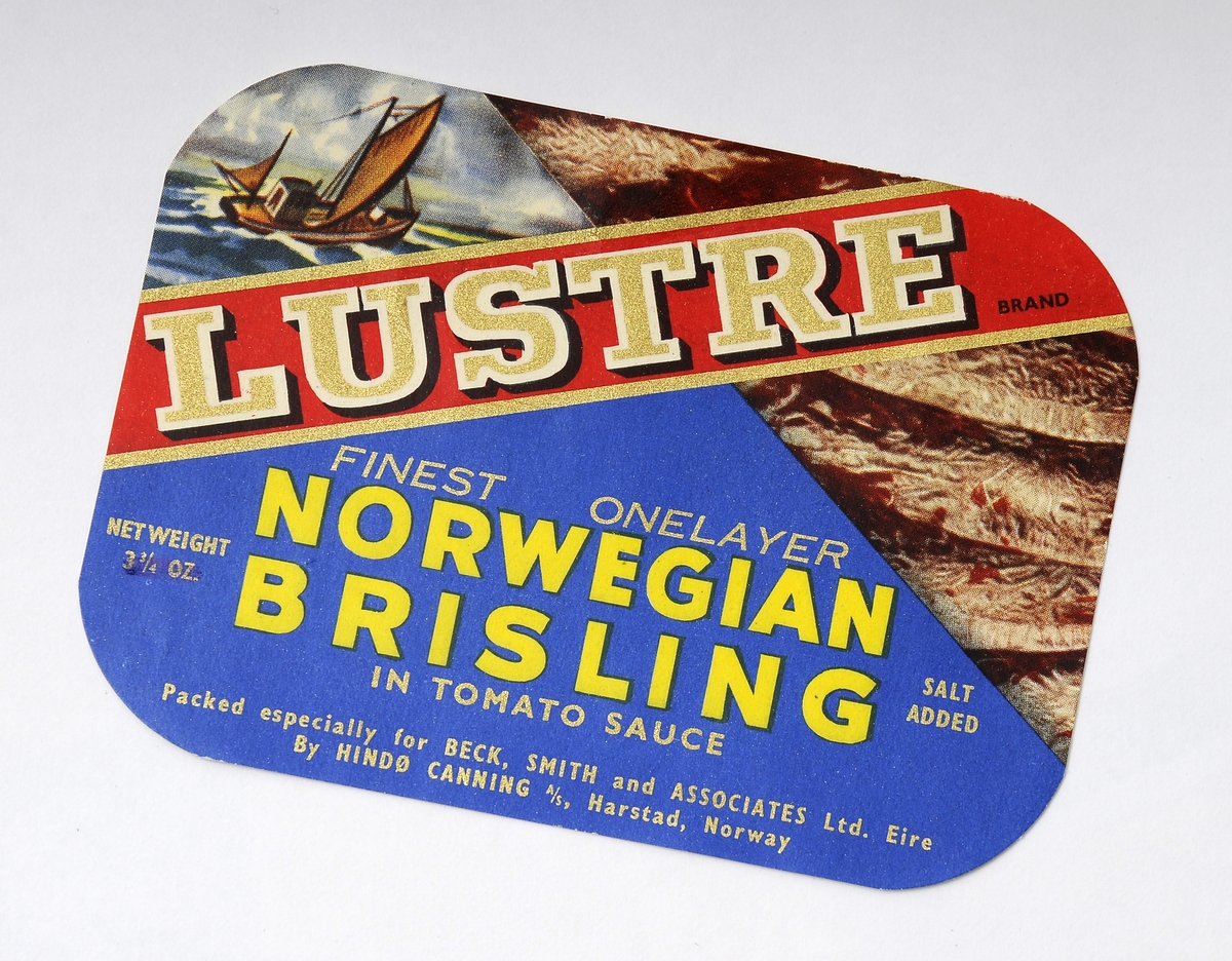 Hermetikketikett, åtte stykker etiketter eller iddiser tilknyttet hermetikkindustrien og produkter som sild, brisling og sardiner. Fire av etikettene er produsert for Eire - med merkenavn Tastea og  Lustre. Ett er laget for det amerikanske markedet - Blue Peter. Embalasjeetikettene ble brukt på ulike hermetikkproduketer og hadde et stort mangfold. Iddiser er i dag samle/bytteobjekter.