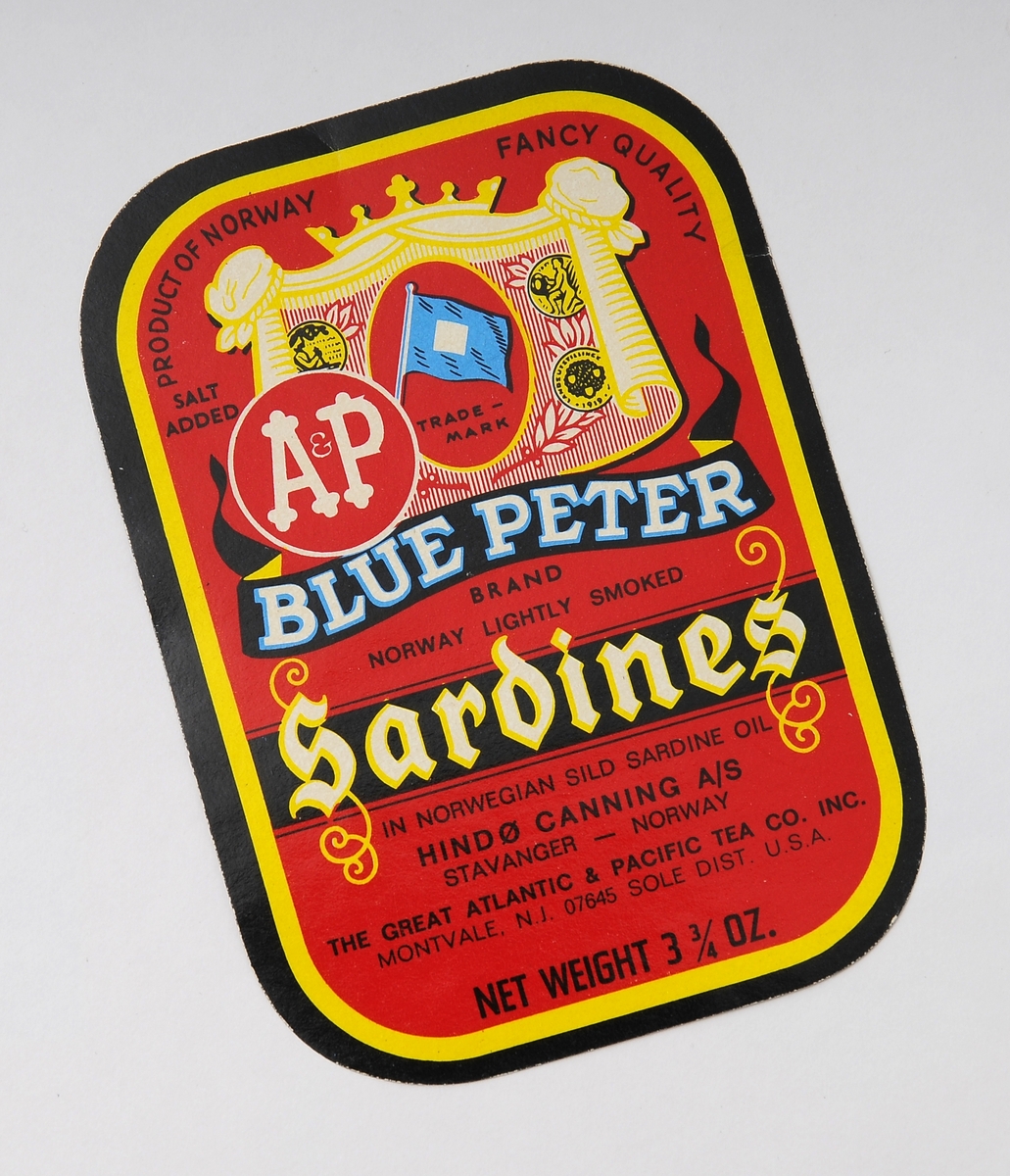 Hermetikketikett, åtte stykker etiketter eller iddiser tilknyttet hermetikkindustrien og produkter som sild, brisling og sardiner. Fire av etikettene er produsert for Eire - med merkenavn Tastea og  Lustre. Ett er laget for det amerikanske markedet - Blue Peter. Embalasjeetikettene ble brukt på ulike hermetikkproduketer og hadde et stort mangfold. Iddiser er i dag samle/bytteobjekter.