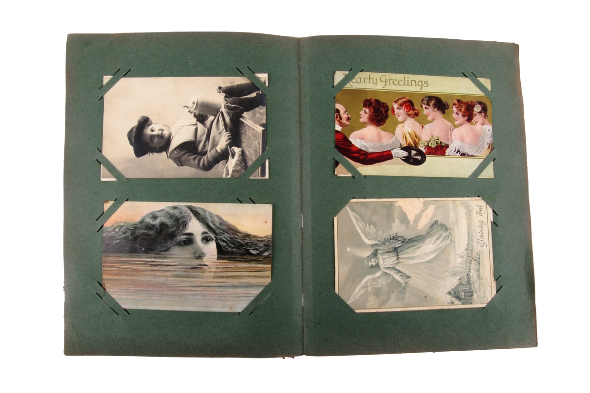 Album som inneholder kort med by- og landskapsmotiv, samt julekort