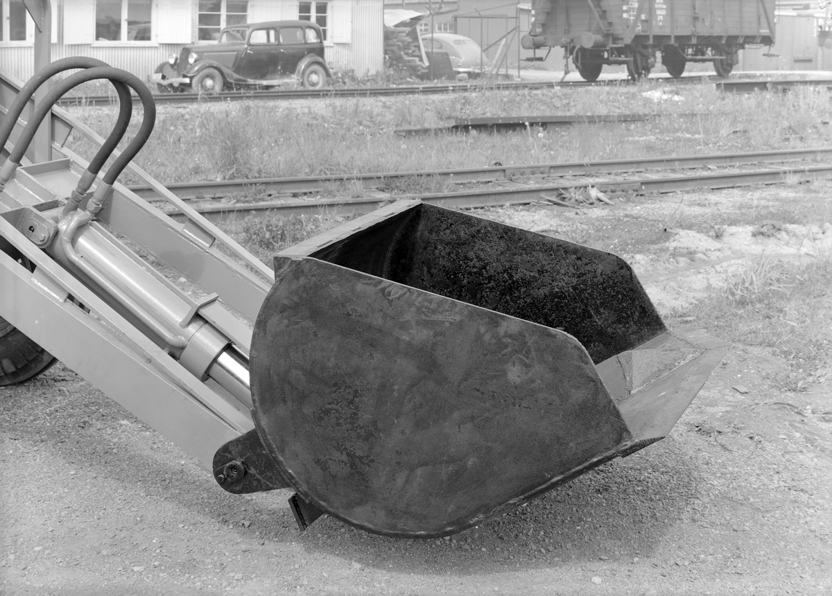 K.N. Schløsser Møller. Traktorer med påmontert lasteapparat