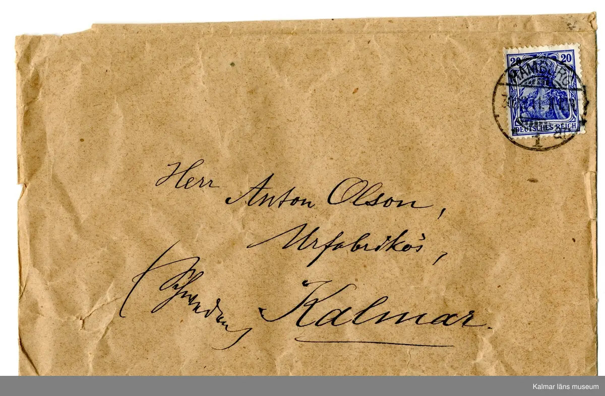 KLM 24993:166 Brev, räkning. Av papper. Kuvert adresserat till urfabrikör Anton Olsson Kalmar. Handskriven räkning för maj-nov 1911 från företaget H. Harms, Hamburg. Daterad 30 Dec 1911.