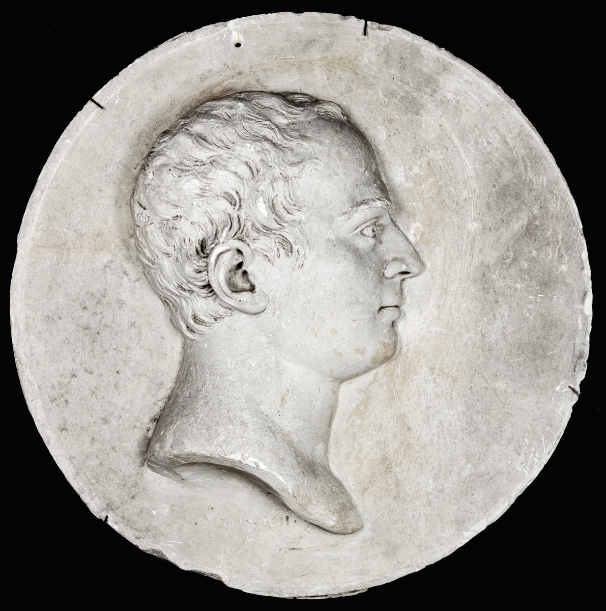 Porträttrelief av okänd man, av Johan Tobias Sergel, 1811.
Originalgips.