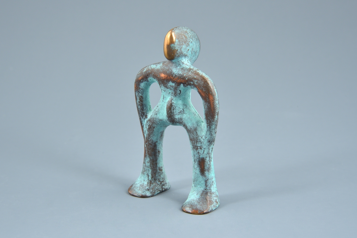 Liten skulptur som symboliserer figur i Norrøn mytologi.

Skulpturen er oppbevart i original emballasje.