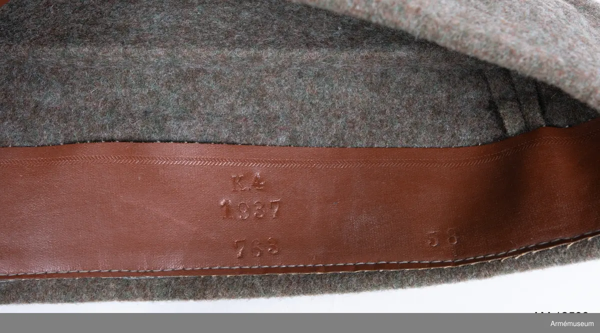 Grupp C I.

Svettrem av läder, märkt 58 (storlek), K.4, 1937, 568.