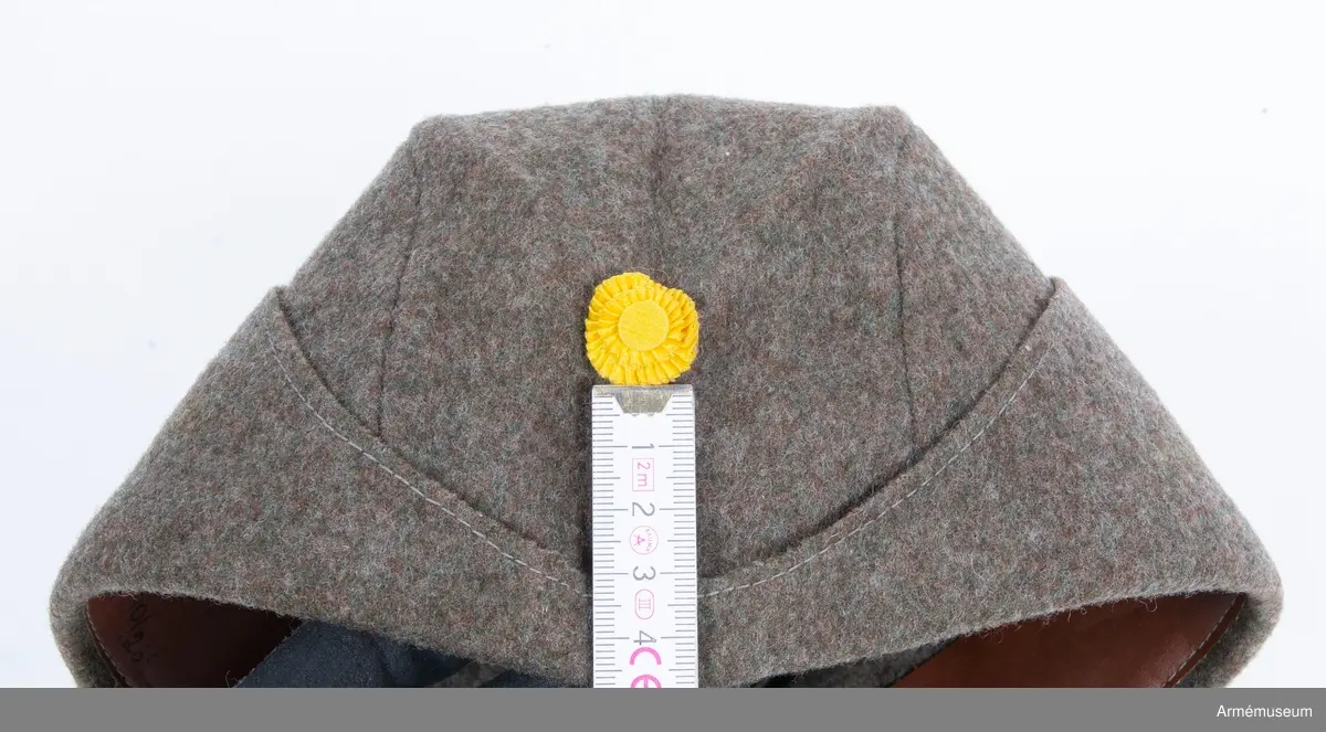 Grupp C I.

Svettrem av läder, märkt 58 (storlek), K.4, 1937, 568.