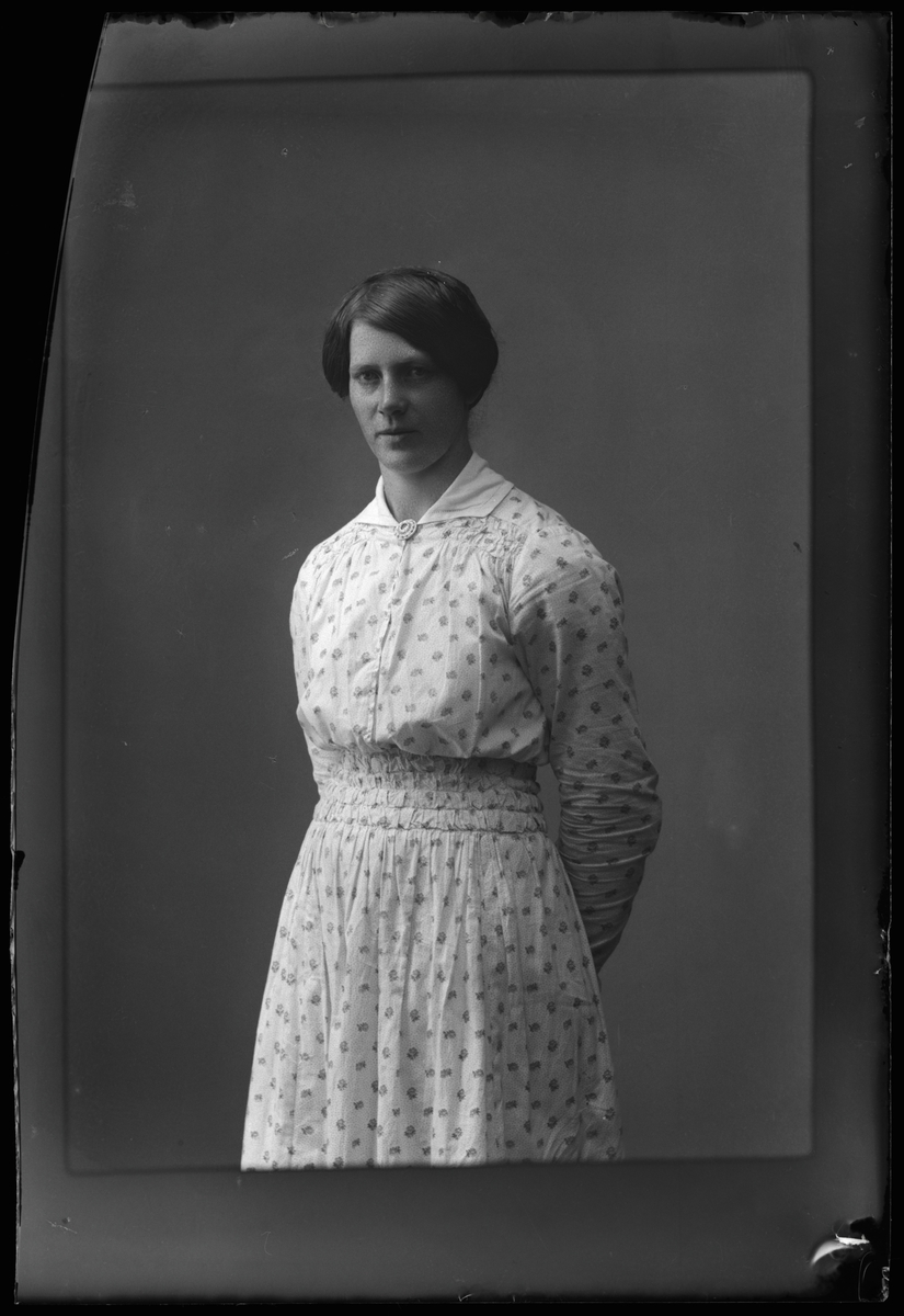 Kvinna