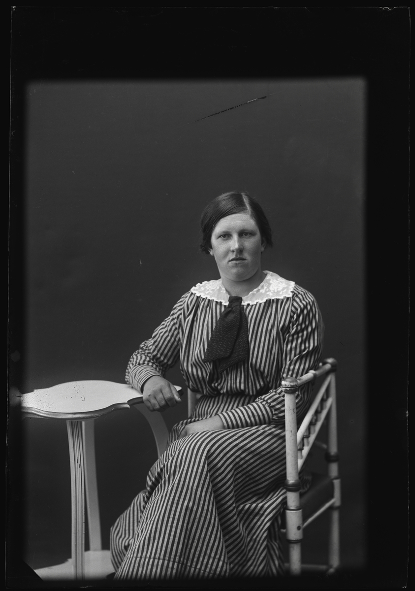 Kvinna