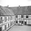 Korsvirkesbebyggelse. Lille Dælundsfelden gård. Danmark 1935.