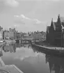 Medeltida hus vid floden Leie i Gent. Tyskland-Holland-Belgien 1938.