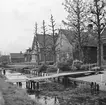 Bebyggelse vid en kanal i Aalsmeer. Tyskland-Holland-Belgien 1938.