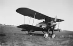 Brittiskt demonstrationsflygplan Gloster GA 17 Gamecock G-EBNT står på flygfältet vid Centrala flygverkstäderna på Malmen, cirka 1926.