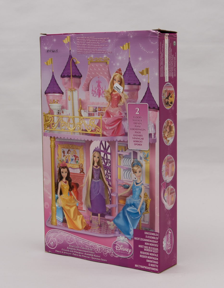 Et barbieslott av merket Disney Princess. Selve slottet/huset er rosa. Flere løse deler: komfyr, vask, lenestol, stol, dusjstang, fire vimpler til spirene, pai/kake, drikkebeger, stekepanne, hjertepute (alt dette i farget plast). Gulvene og bakvegger i papp med farget motiv.