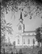 RESTAURERAD KYRKA I NJURUNDA
EXT. OCH INT.