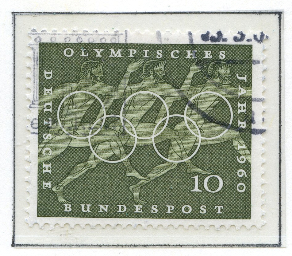 Syv frimerker med motiver fra de klassiske greske olympiske leker montert på albumark i størrelse A4. De første fire frimerkene viser øvelser fra de klassiske lekene med ol-ringene i forgrunnen, og ulik bakgrunnsfarge. Disse er utgitt i Tyskland, i fbm med sommer-OL i Roma 1960. Et frimerke utgitt i Paraguy i 1980 viser hodet til Satyros (gresk arkitekt fra antikken) plassert på et ark som viser ruinene etter Olympiastadion. De to siste frimerkene viser en gresk atlet fra antikken med de olympiske ringer over. Frimerkene er utgitt i Saarområdet (på gensen mellom Tyskland og Frankrike), som hadde sin egen olympiske komité i årene etter første og andre verdenskrig.